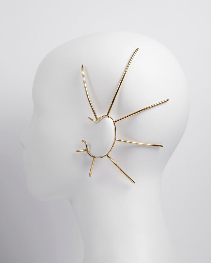 large spiked ear cuff jewelry, with spikes runing along the head