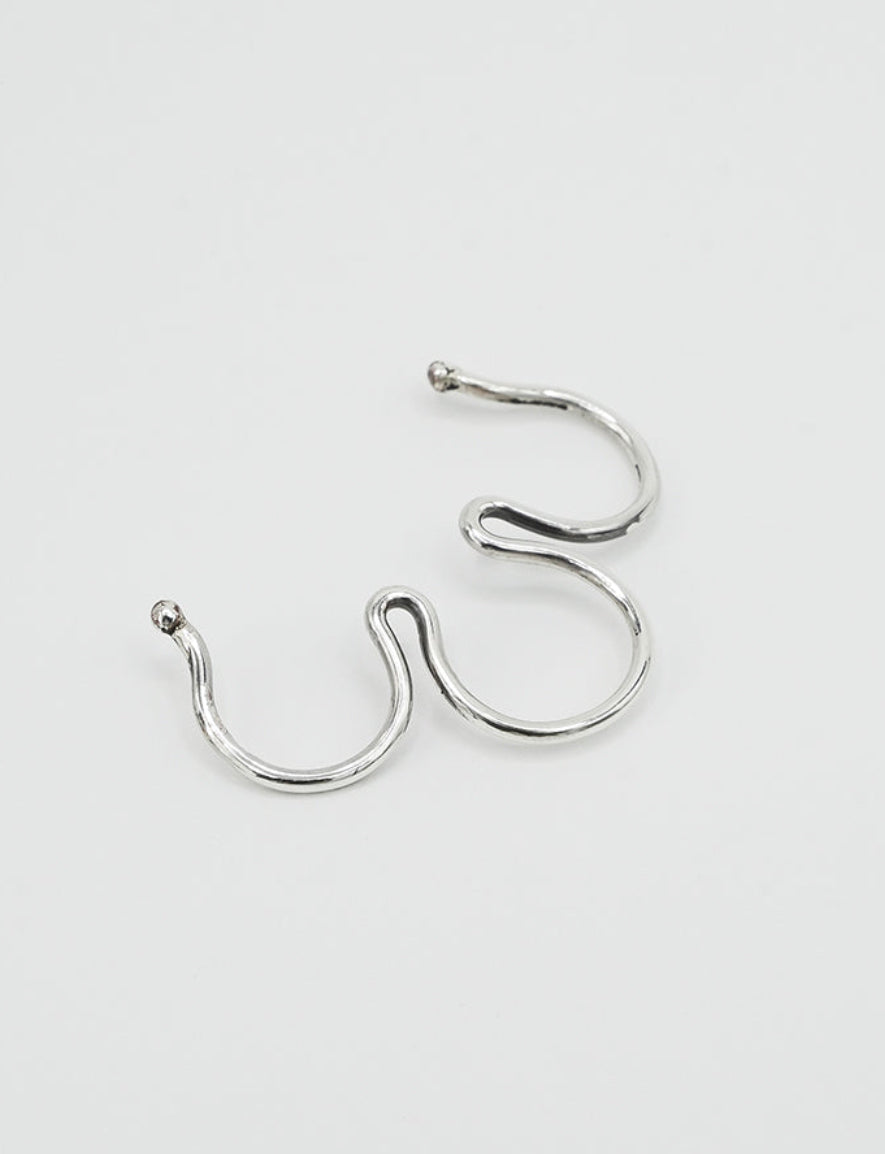 Handmade silver fake septum ring.