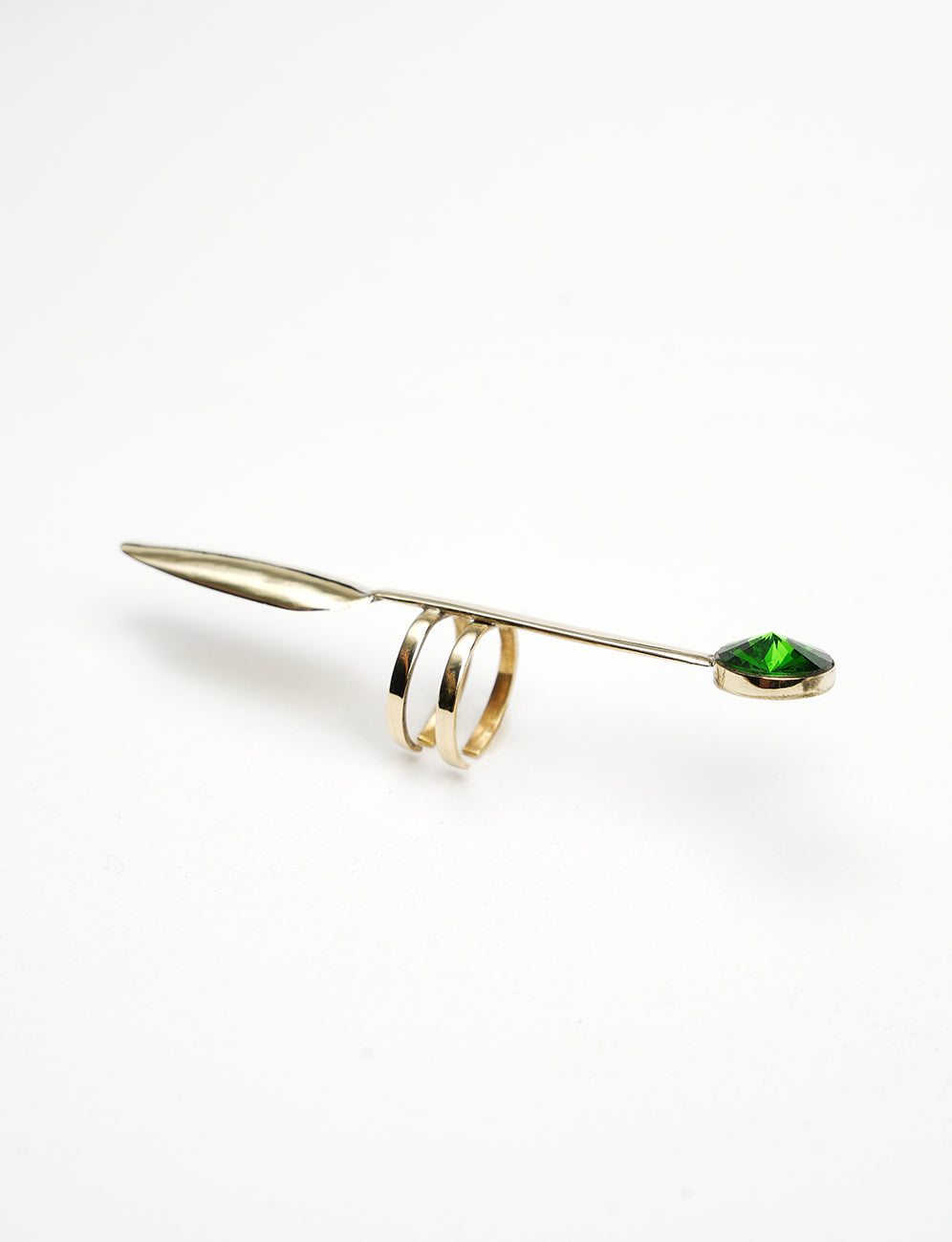 modern and contemporary phalange ring in gold color with a green Swarovski stone. 