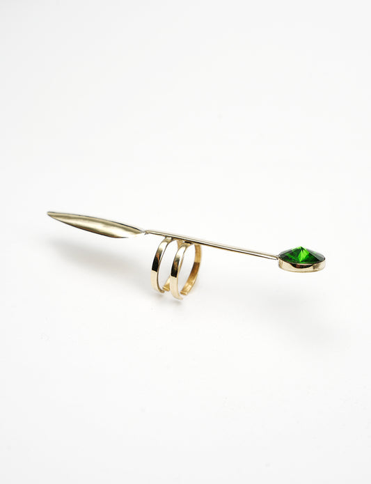 modern and contemporary phalange ring in gold color with a green Swarovski stone. 
