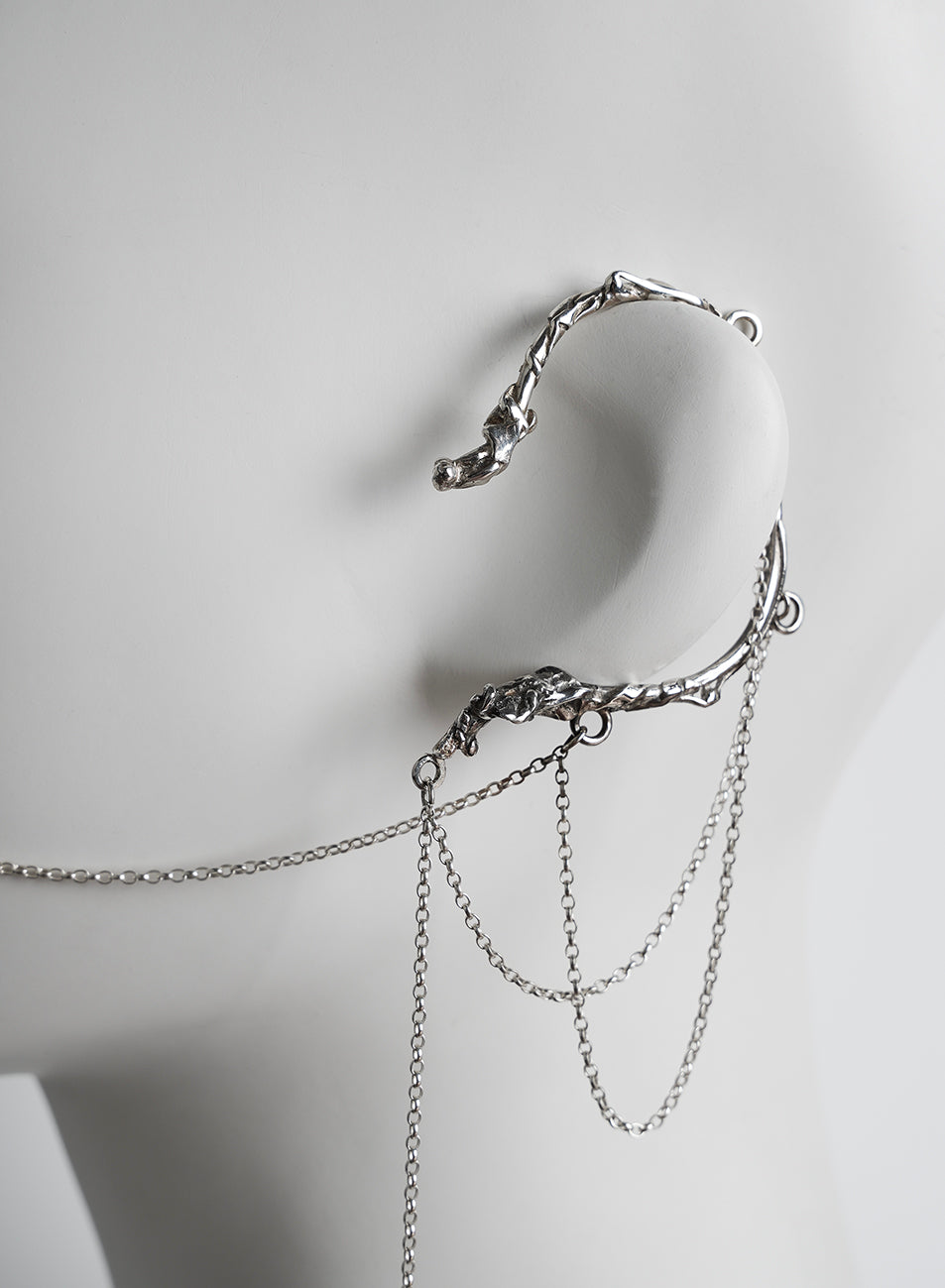 raw jewelry ear cuff, one of a kind, in silver with chains 