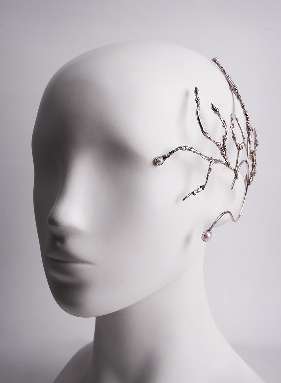 a very special piece of ear jewelry that covers a part of the head