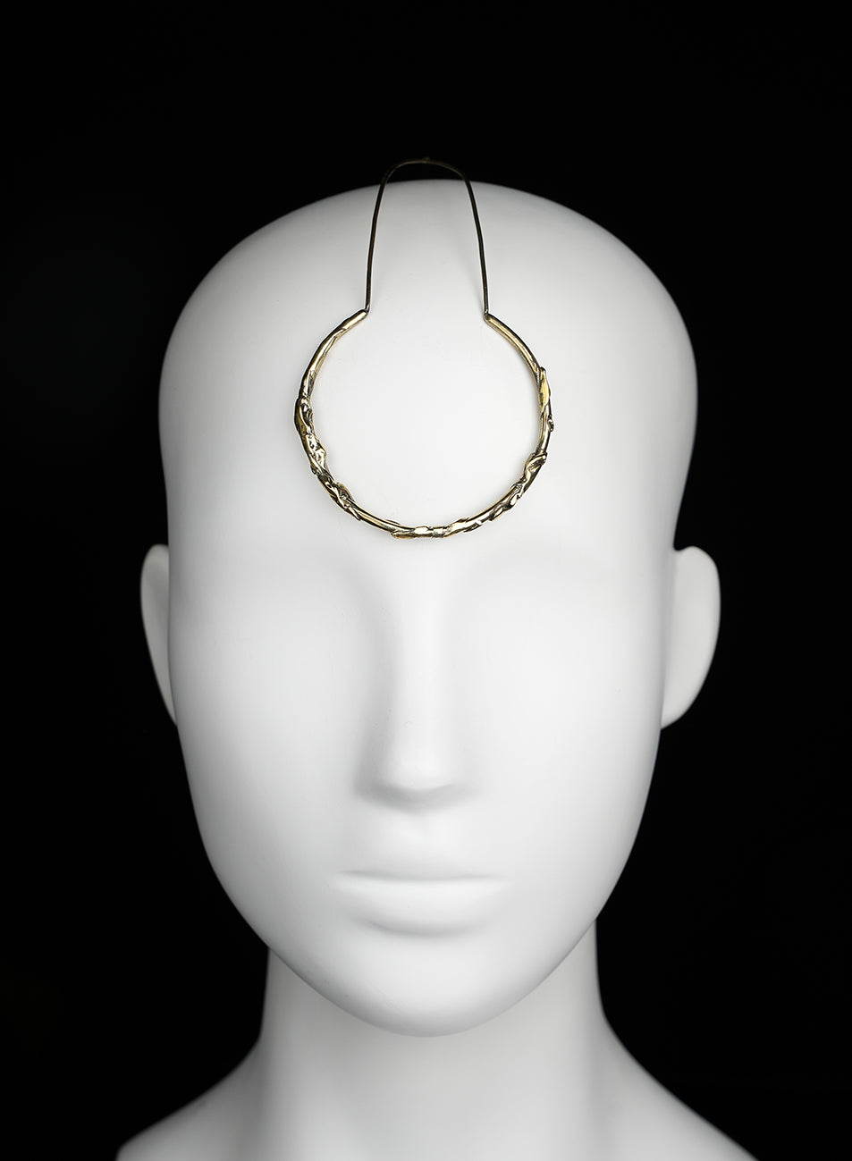 Unique headpiece featuring a symbolic circle on the forehead