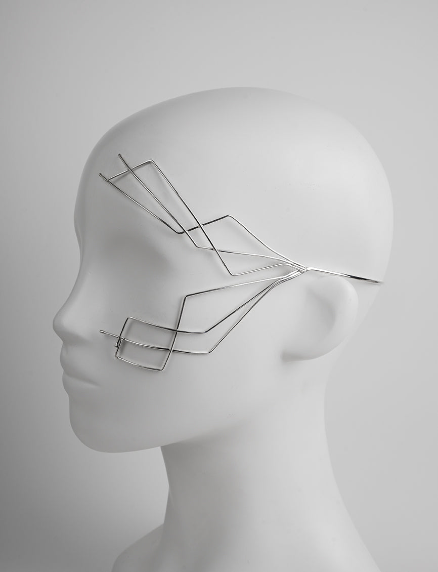 contemporary and futuristic face jewelry