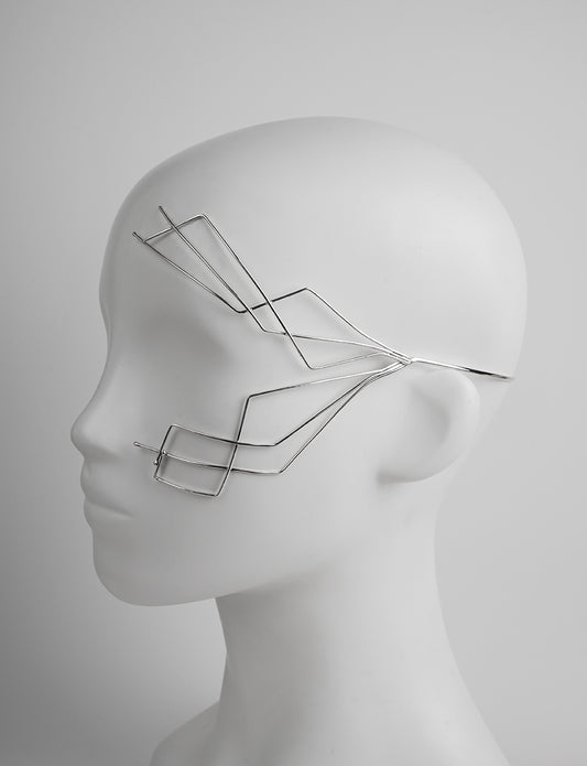 contemporary and futuristic face jewelry