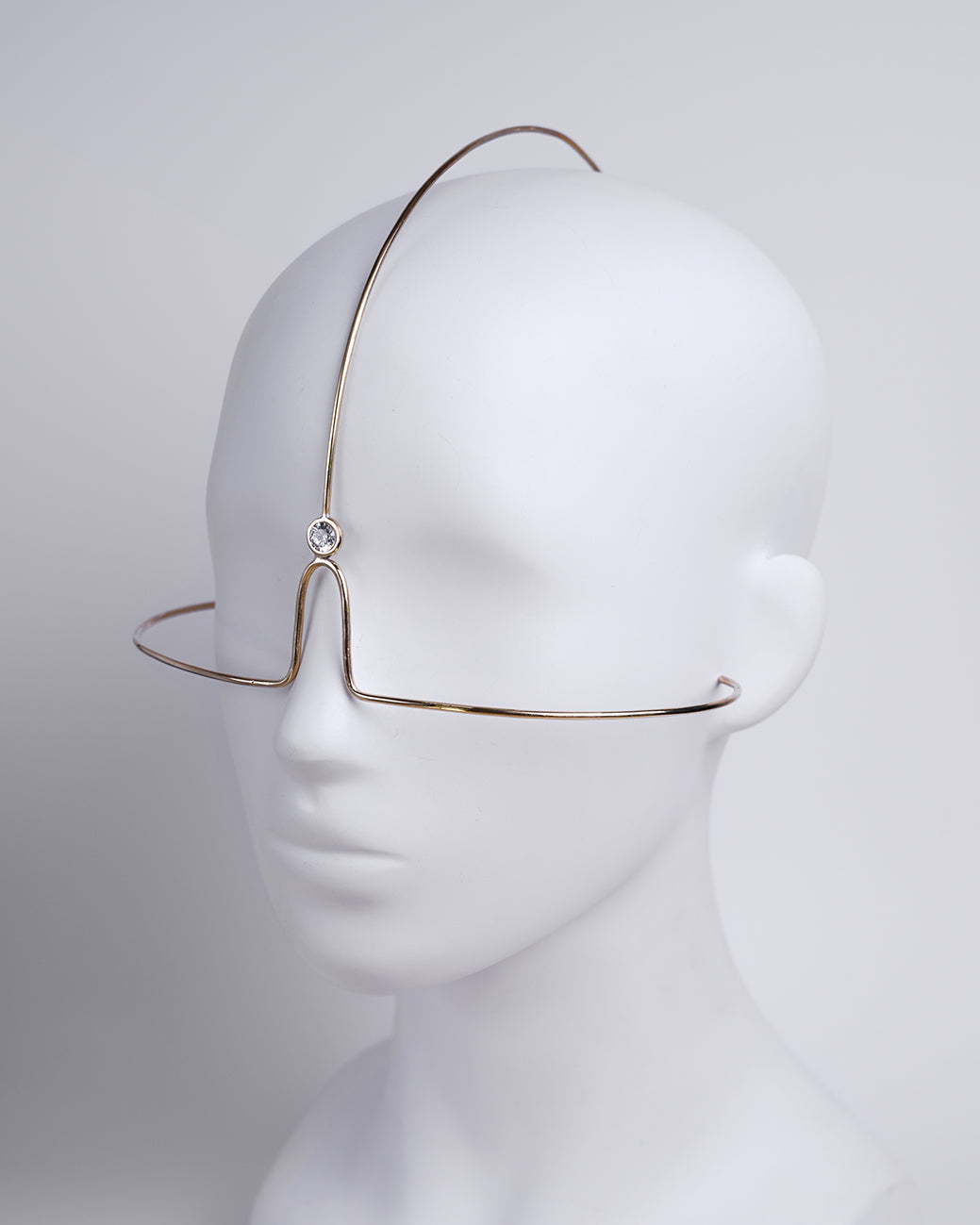 A golden, elegant, and stunning piece of jewelry that flatters every face
