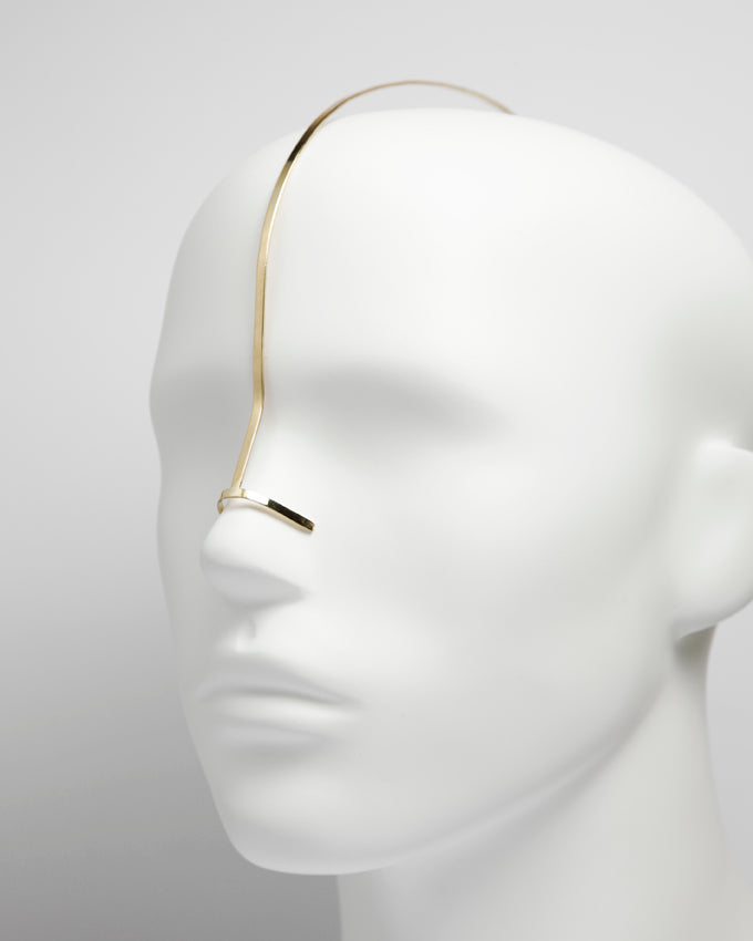 futuristic jewelry, face jewel design gold color
