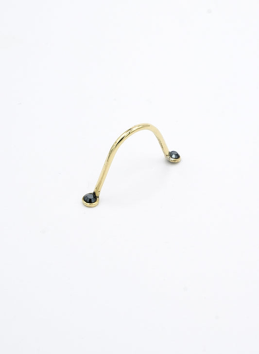 face jewelry that adapts to the nose bridge. No piercing jewelry, gold color and black crystals