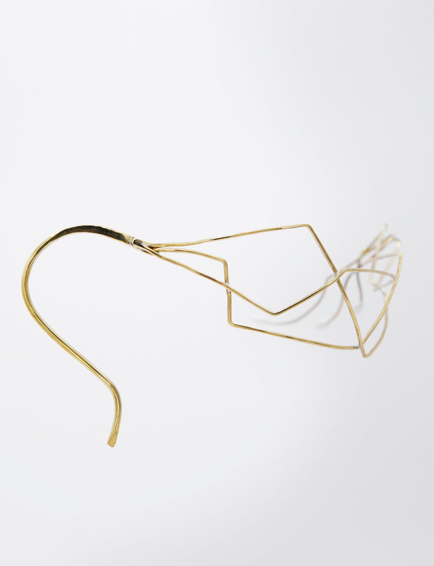 golden face jewelry, asymetrical design