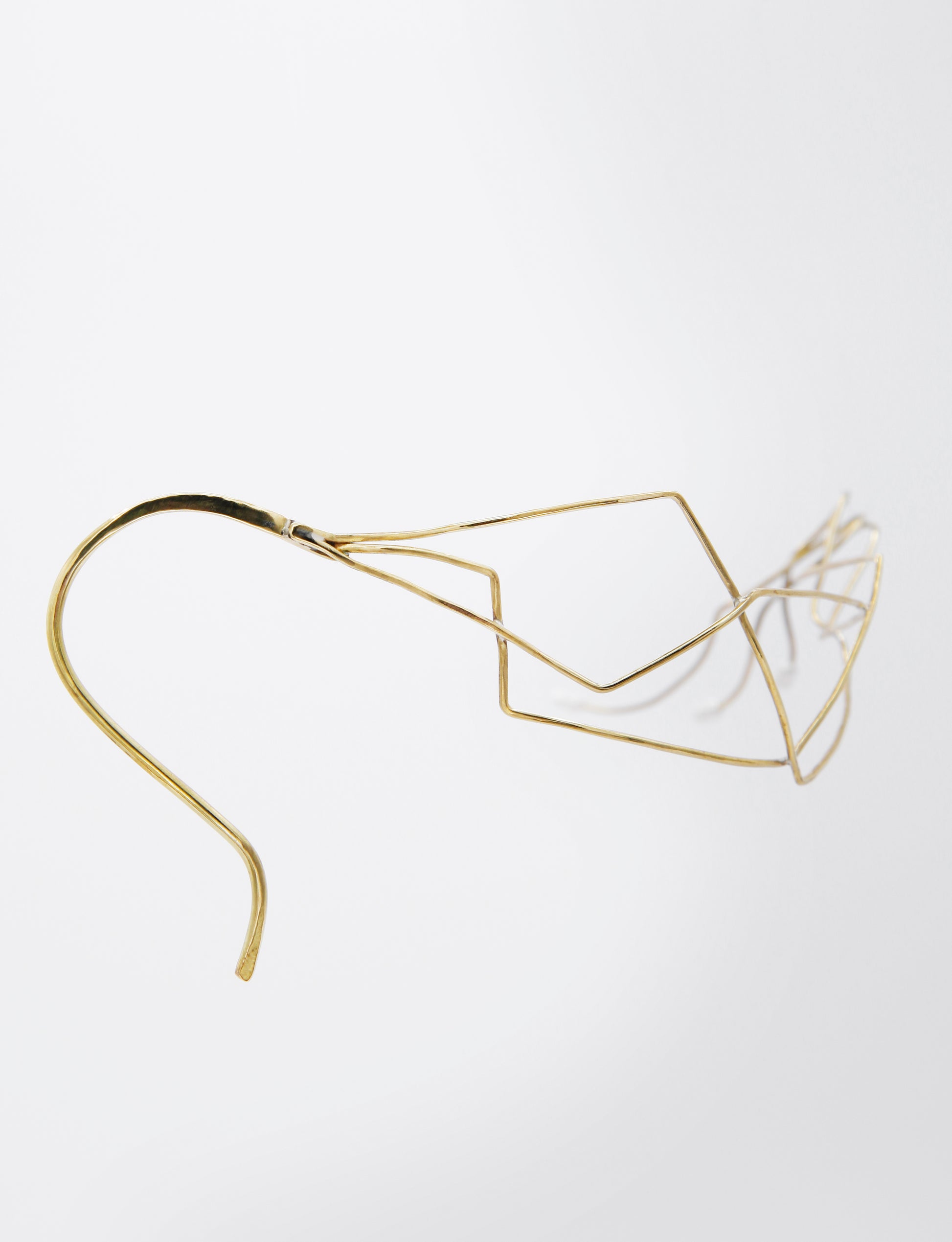 golden face jewelry, asymetrical design
