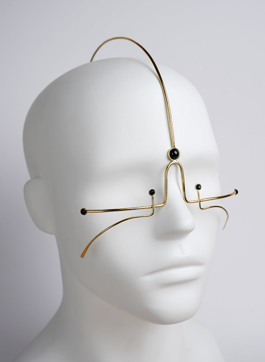 face jewelry decoration in gold color with black crystals
