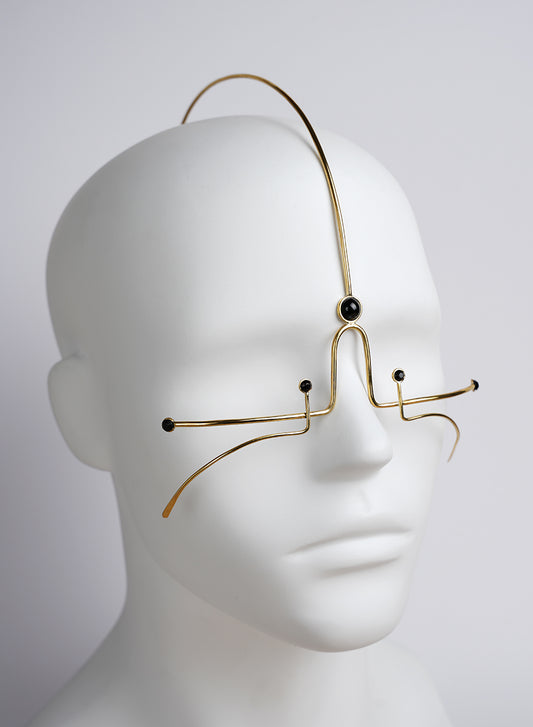 face jewelry decoration in gold color with black crystals