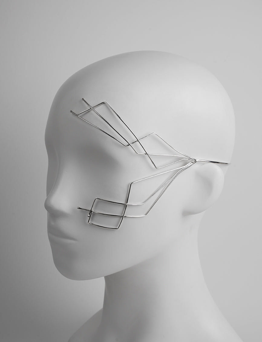 sublime silver face adornment, very design geometrical and asymetrical aesthetic