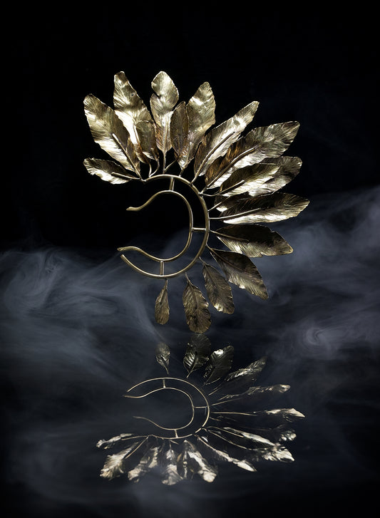 Stunning extra-large gold-tone ear cuff with a floral design. 