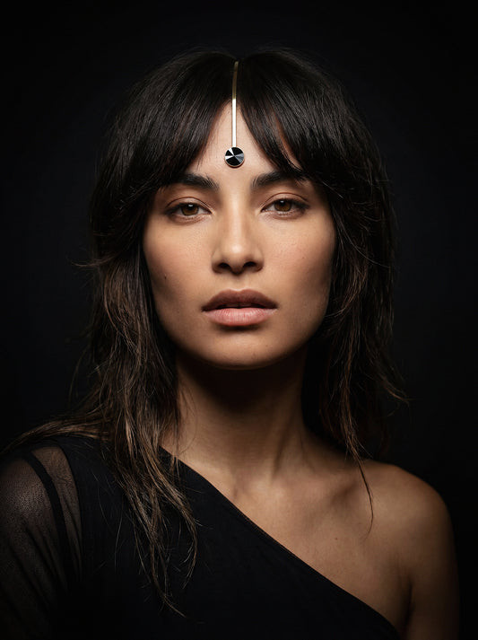 Gold face jewelry. Contemporary gold-tone metal jewelry perfect for face decoration.