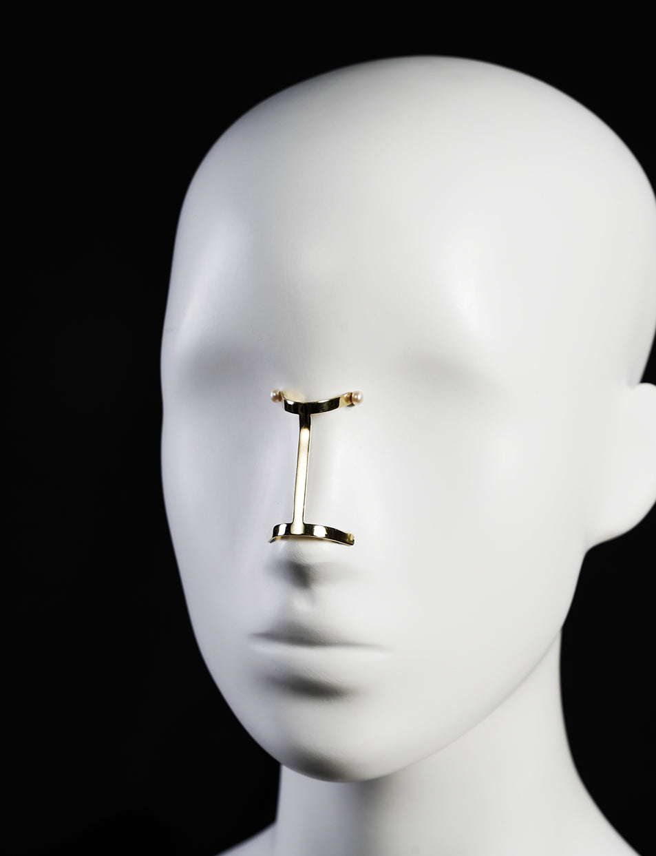 golden jewelry accessory for the nose, no piercing