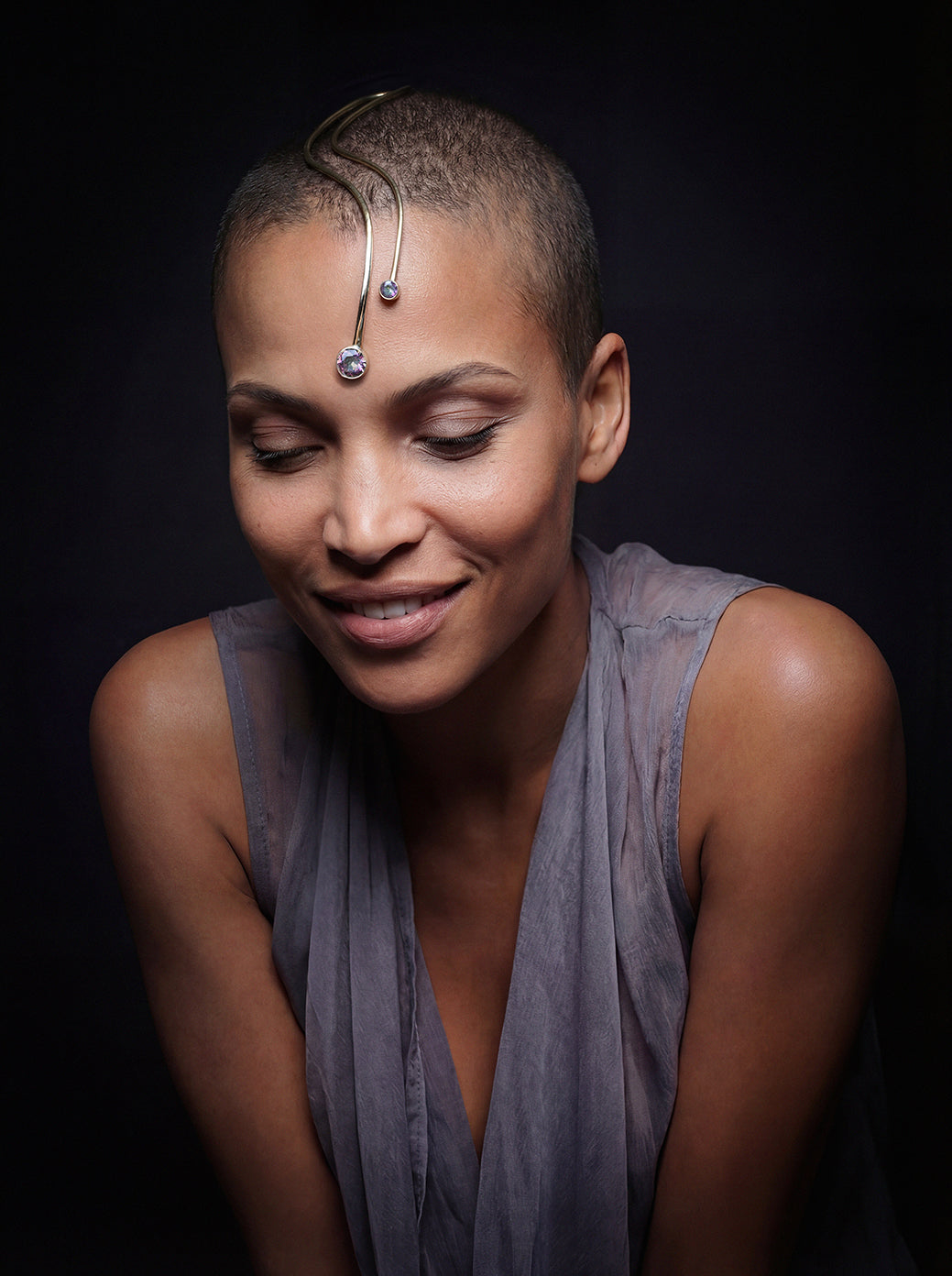 head adornment jewelry, golden color with two rainbow crystals