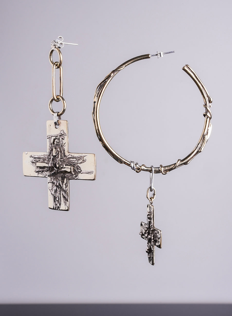 oversized asymmetrical earrings, crafted like a work of art 