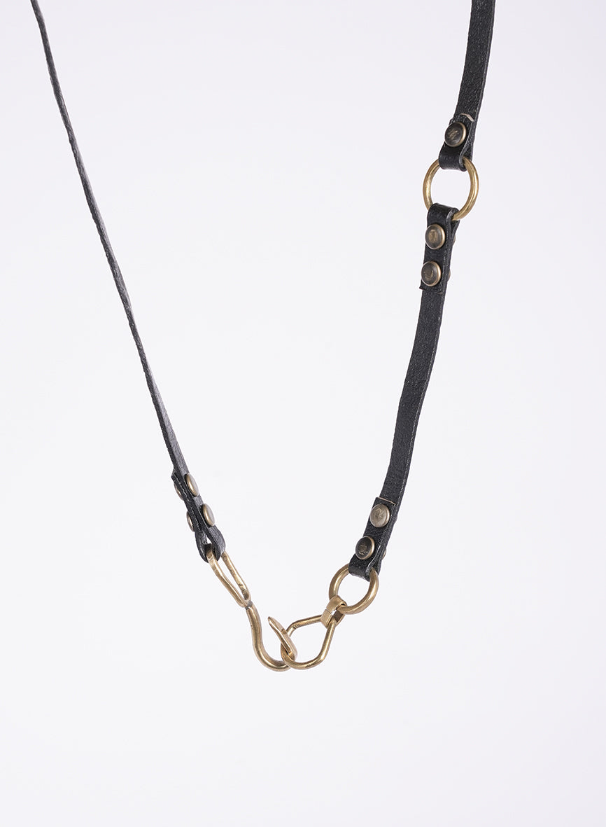 artisanal long necklace, with leather and gold metal, cross pendant
