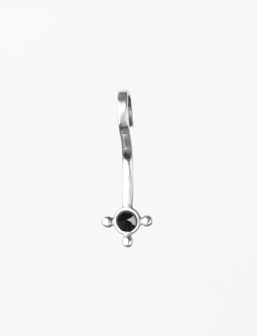 lip clip jewelry in silver with a black faceted crystal 