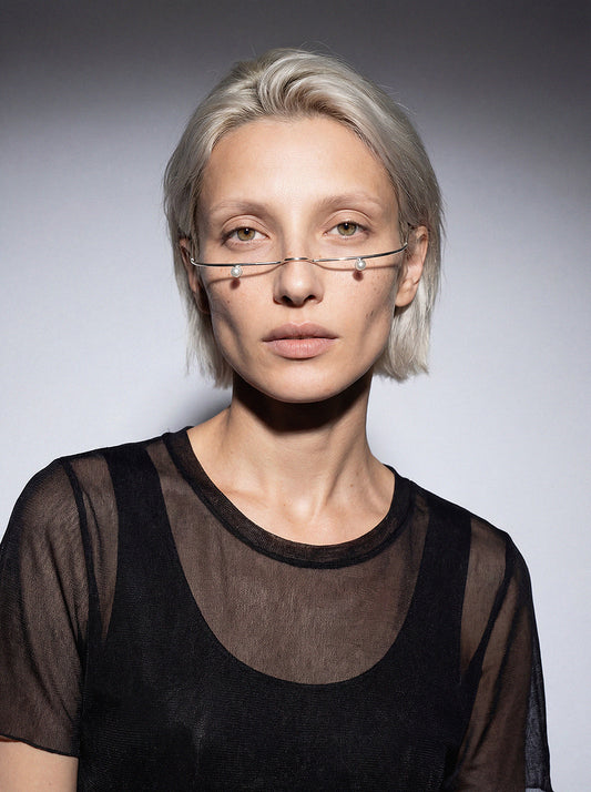 A beautiful, minimalist, and sleek piece of jewelry that perfectly complements the contours of the face 