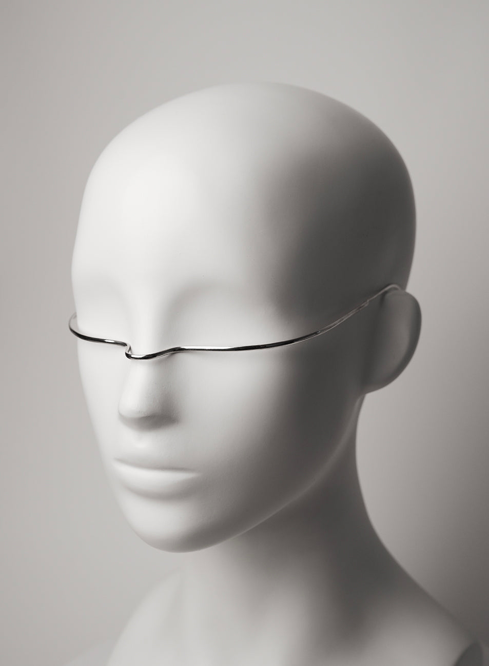 fashion face jewlery piece in silver 