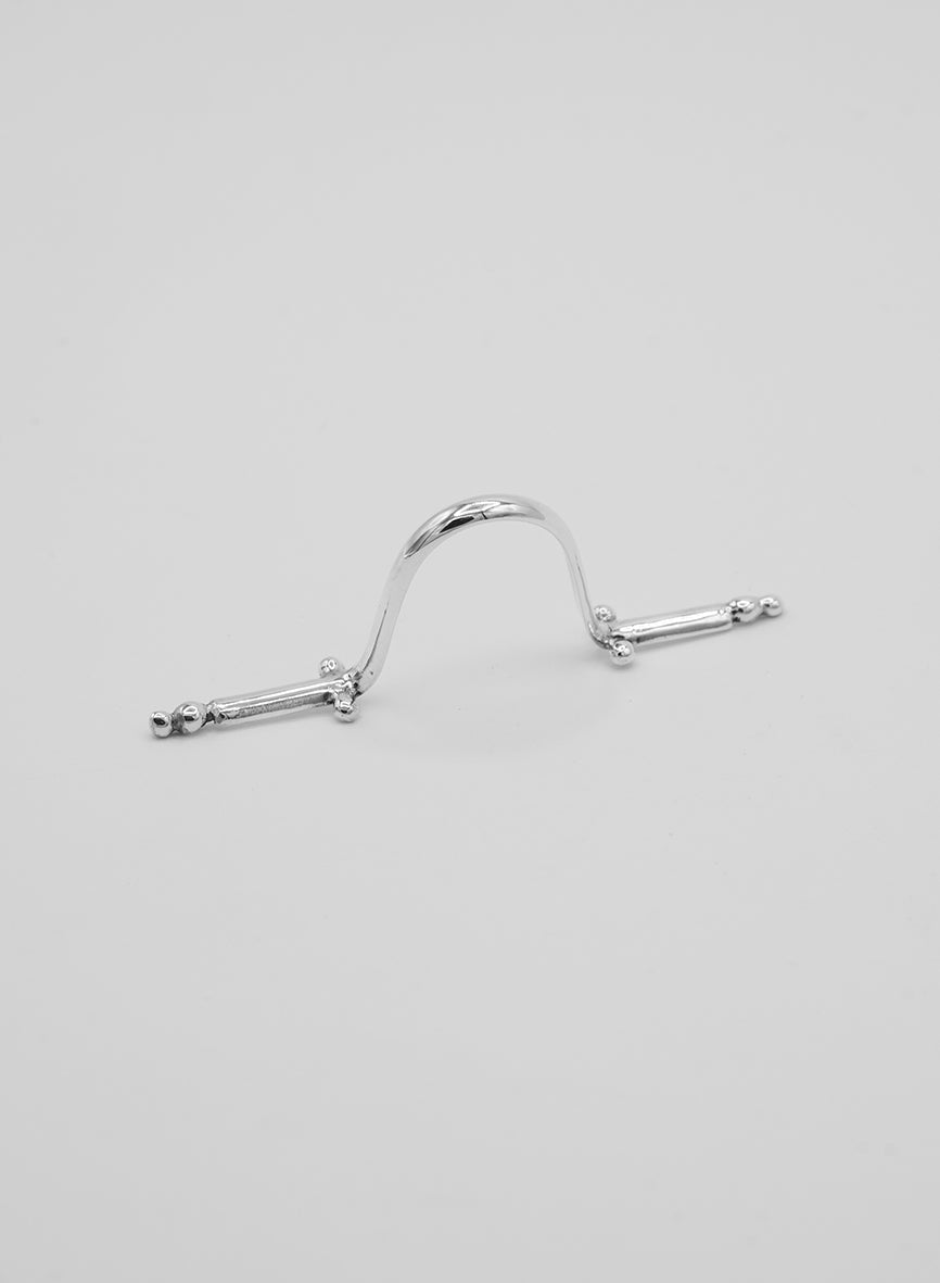 A silver nose ring with beautiful detais, handmade, no piercing.