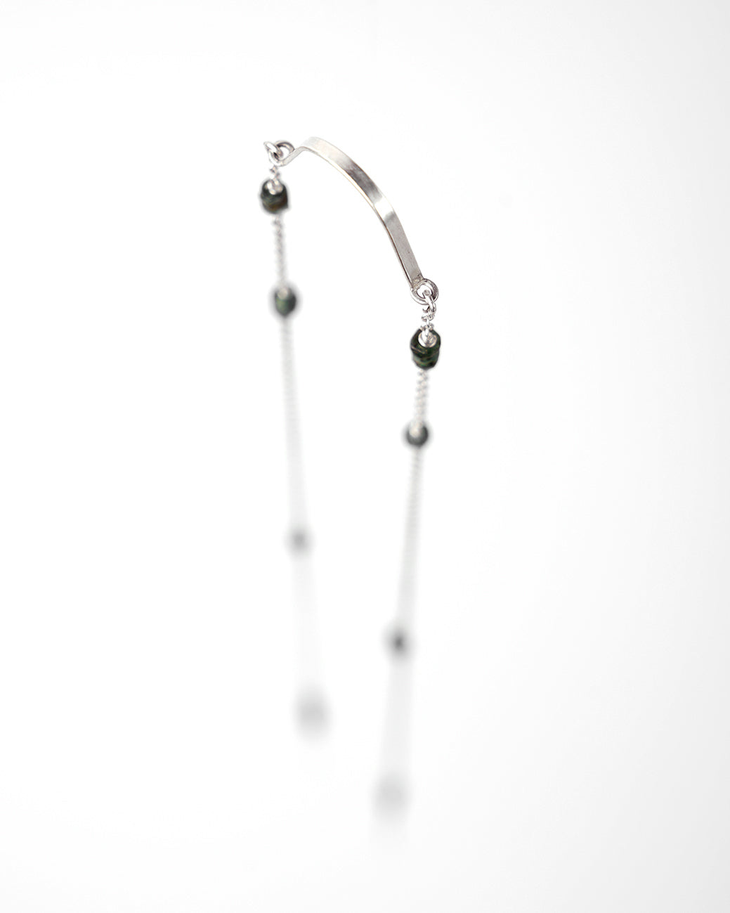 fake bridge piercing with chains