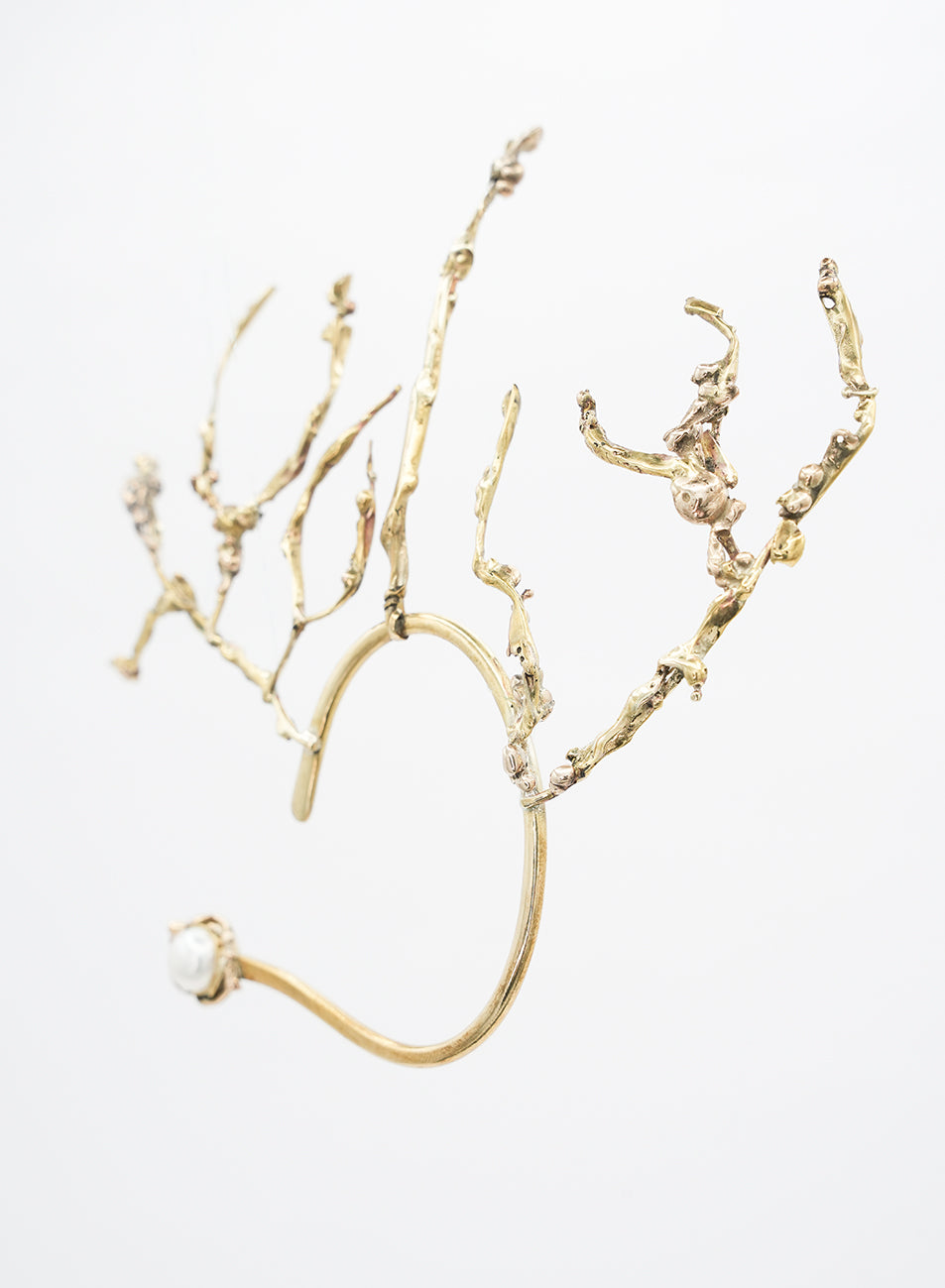 golden clip-on earring jewelry, raw and organic with pearl