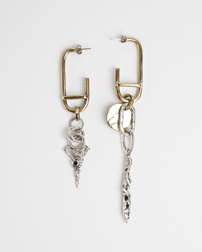 unique pair of asymetrical raw earrings
