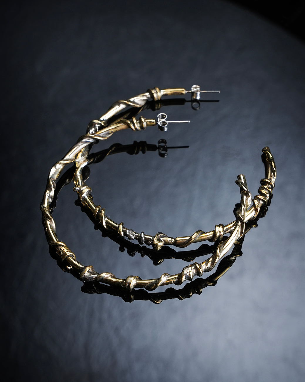 Handcrafted XXL hoop earrings in silver and brass 