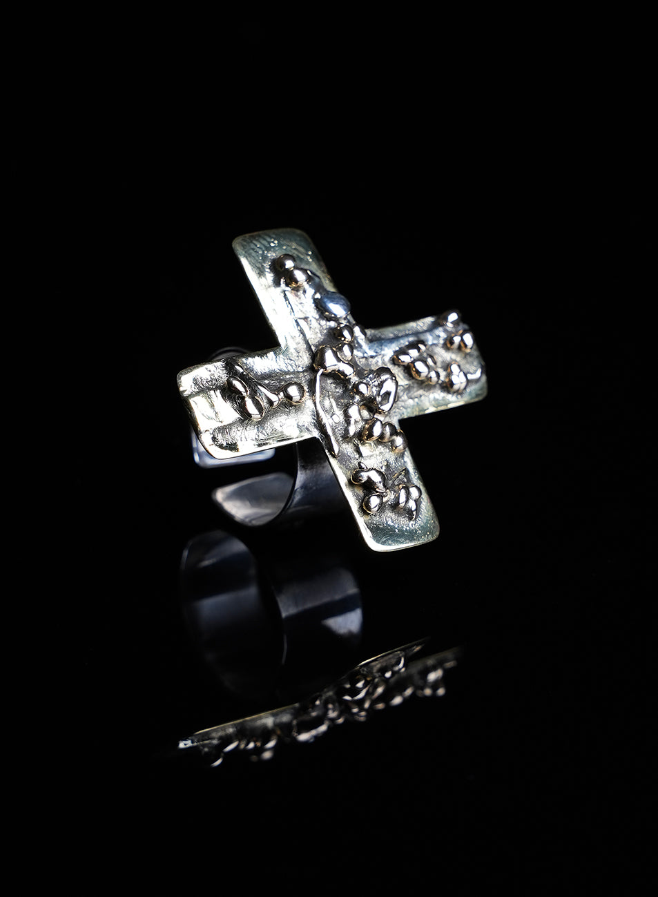 strong designed one of a kind ring, gold and silver