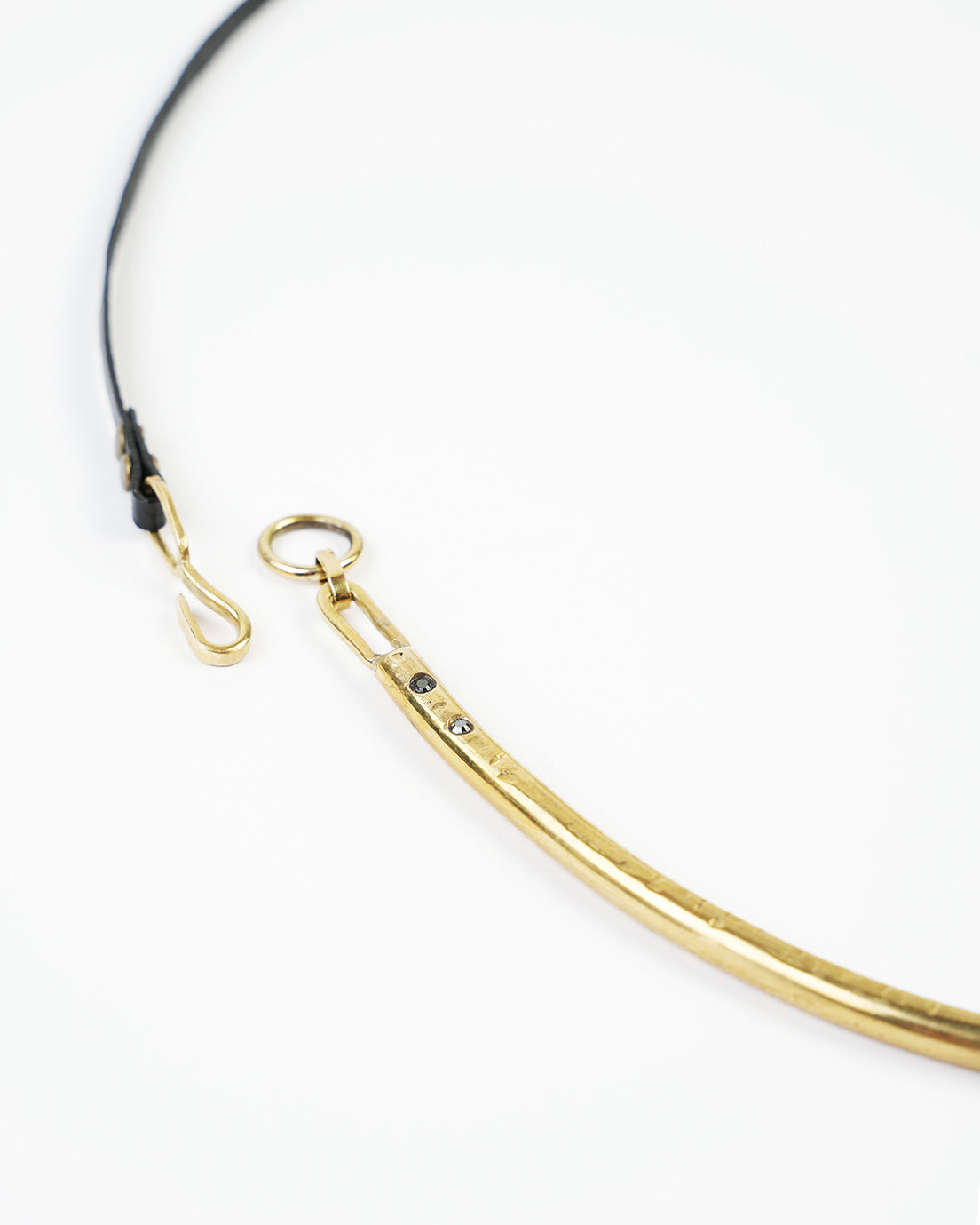 large raw necklace, gold color with leather strap