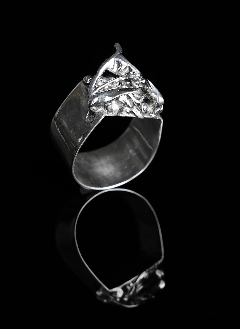 Handcrafted silver ring featuring beautiful relief patterns created by the metal's natural fusion 