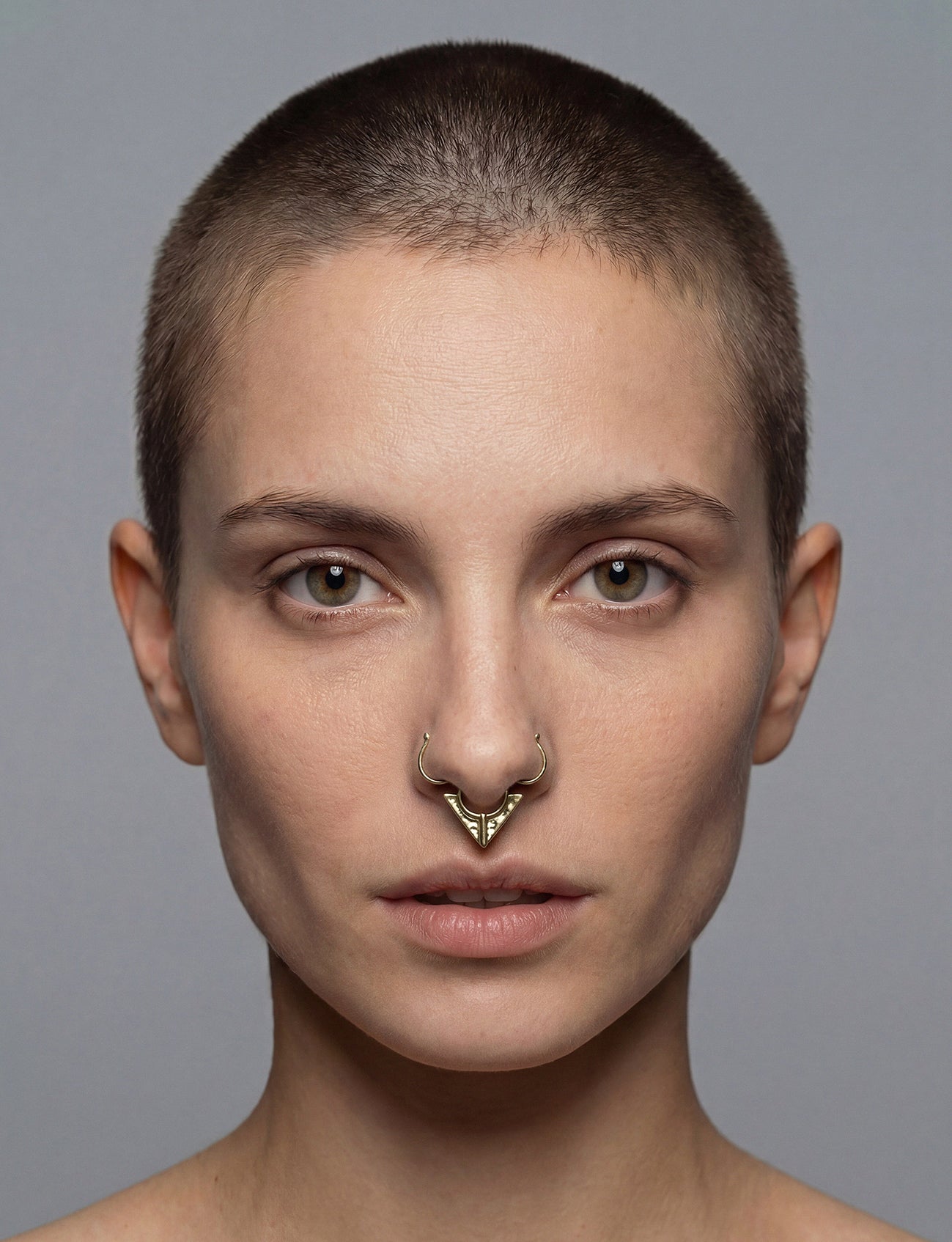 Fake septum ring, triangle shape, gold color.