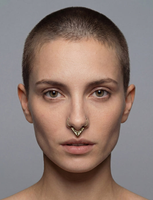 Fake septum ring, triangle shape, gold color.