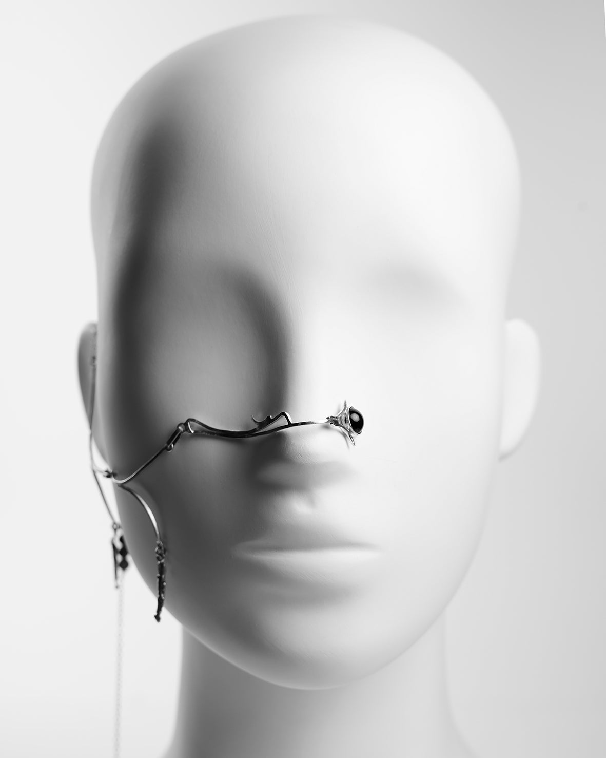 one of a kind jewelry piece, asymetrical nose clip with chain and pendant. No piercing