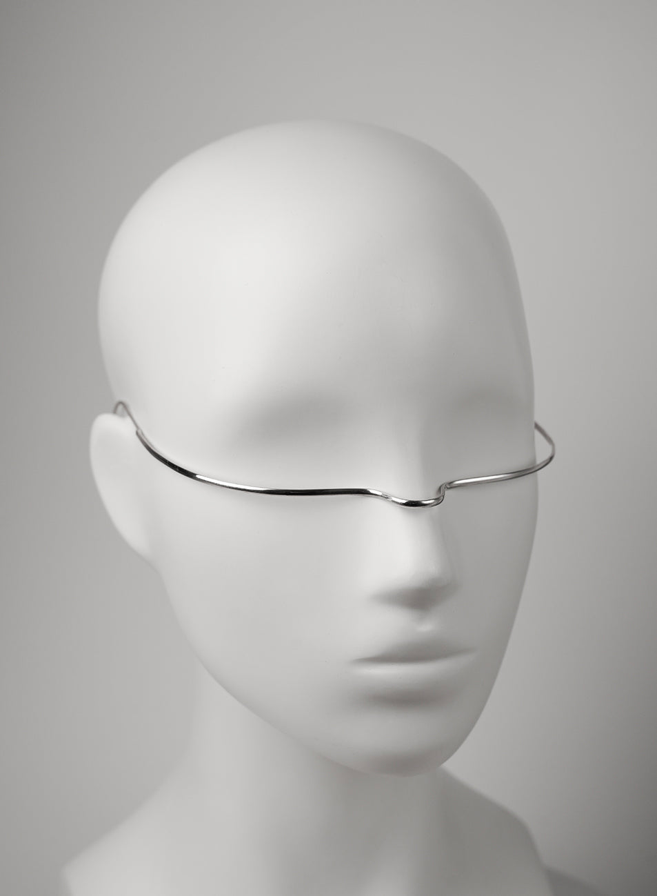 minimalist silver line for the face, jewelry designer