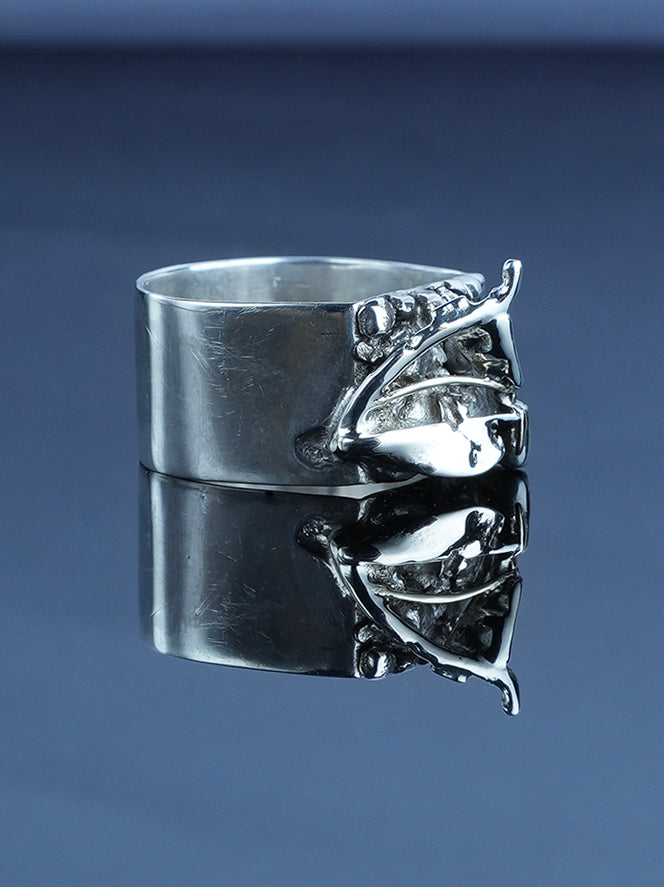 Handcrafted silver ring featuring beautiful relief patterns created by the metal's natural fusion 